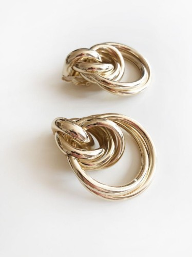 Duże plecione złote klipsy