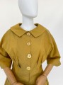 Rozkloszowana sukienka vintage 50's